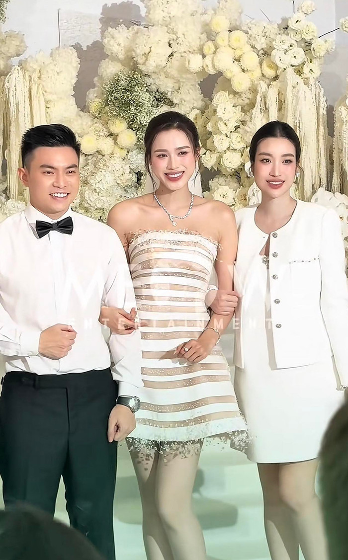 Đỗ Mỹ Linh tại đám cưới của Đỗ Thị Hà, để lộ nghi vấn đang mang thai. (Ản h chụp màn hình từ TikTok Meow Entertainment)