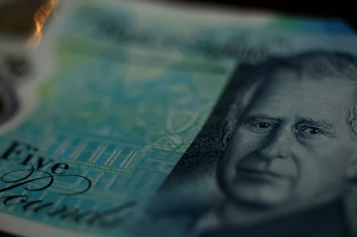 Chân dung Vua Charles được in trên tờ tiền năm bảng Anh. Ảnh: Reuters