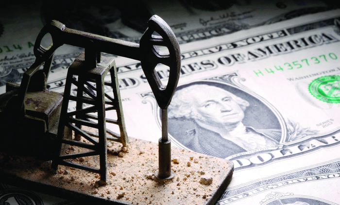 Chỉ số USD so với rổ tiền tệ chính tăng nhẹ, giữ quanh mức 98,57 (Ảnh: Reuters).