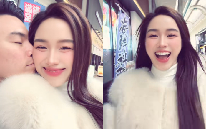 Đỗ Thị Hà cười tươi rói sau khi được chồng hôn má. Ảnh chụp màn hình
