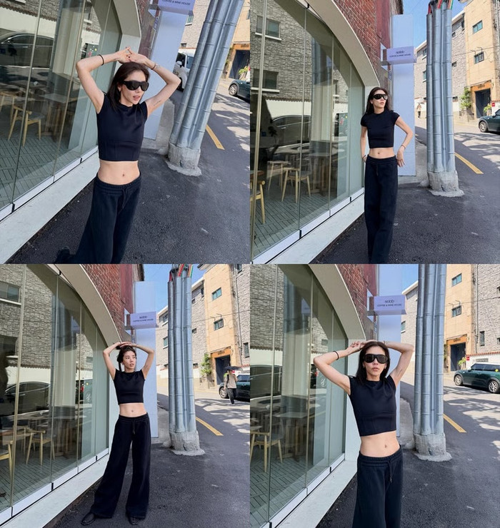 Son Dam Bi khoe cơ bụng săn chắc sau 1 năm sinh con.