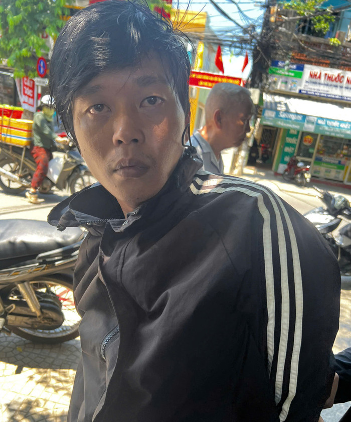 Đối tượng Dương Trung Nghĩa tại thời điểm bị bắt giữ. Ảnh: Công an TP Đà Nẵng&nbsp;