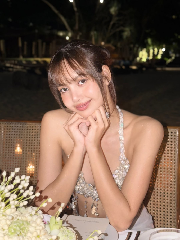 Lisa lựa chọn giữ im lặng trước tấm hình tình tứ với nam người mẫu Fai Khadra. Ảnh: IGNV