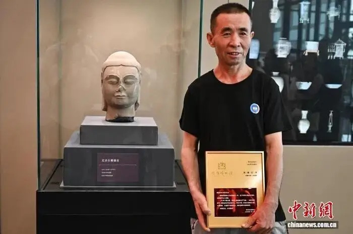 Phát hiện đầu tượng Phật 1.400 năm tuổi lúc đào đất, người đàn ông được thưởng 36 triệu đồng Ảnh 1