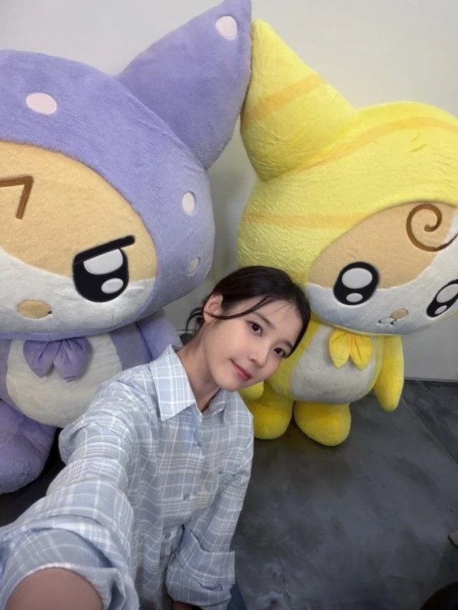 Động thái của IU giữa lúc hoãn album và concert Ảnh 1