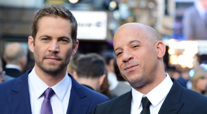 Vin Diesel xúc động khi nhắc về Paul Walker trong đêm kỷ niệm 25 năm The Fast and the Furious. Ảnh: Getty Images.
