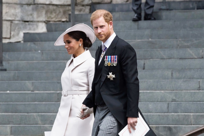 Vợ chồng Harry và Meghan (Ảnh: AFP).