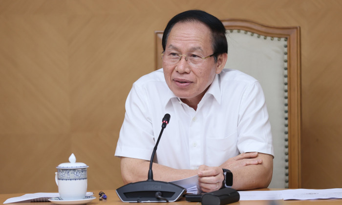Phó Thủ tướng Lê Tiến Châu trao đổi tại buổi làm việc. Ảnh: MOET