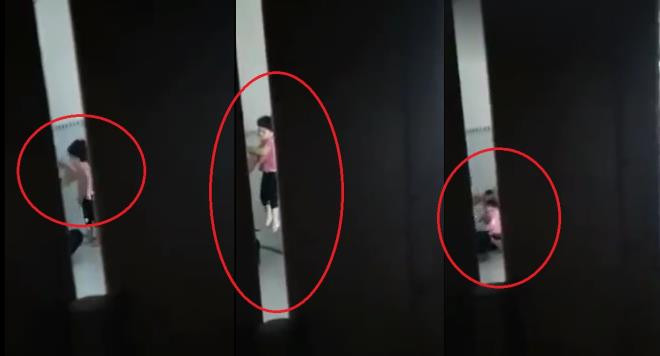 Bé gái bị đánh, bóp cổ... Ảnh cắt từ clip