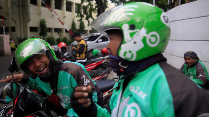 Cùng Grab, Go-Jek mong muốn xây dựng hình ảnh một siêu ứng dụng đa dịch vụ. Ảnh: Nikkei