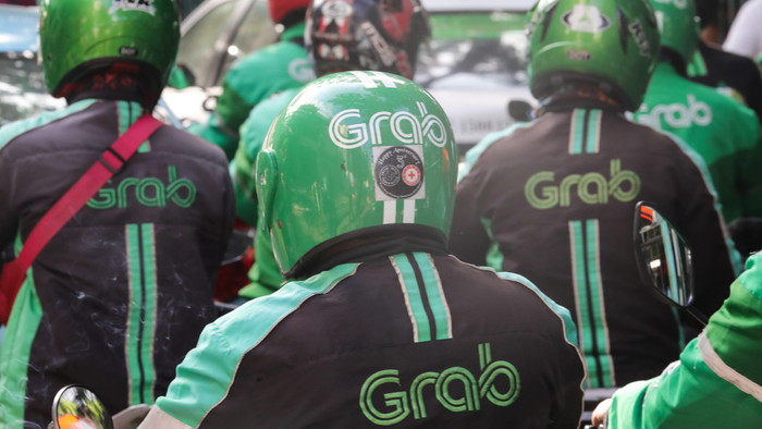 Vị thế dẫn đầu thị trường tại nhiều quốc gia khiến Grab chịu nhiều ngờ vực liên quan đến quản lí cạnh tranh từ giới chức. Ảnh: Nikkei