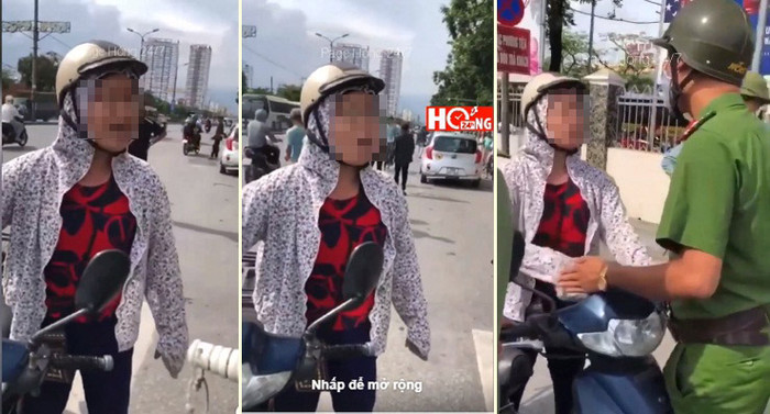 Người phụ nữ cố gắng cãi cùn với CSTT khi đi xe máy ngược chiều. 