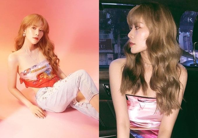 Nam Em trong mái tóc vàng uốn gợn sóng, hình ảnh này của cô được đánh giá là 'phiên bản Viêt:của Rose - BLACKPINK. Cô chọn bandana hồng, mix cùng quần ôm đen giúp tôn vòng một và vai trần. 