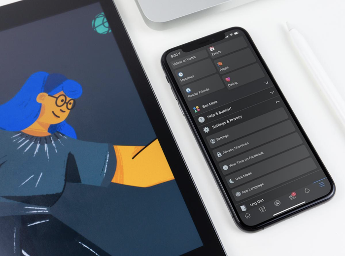 Giao diện tối của Facebook nghiêng về tông xám dịu mắt với điểm nhấn màu trắng ở phần chữ và logo biểu tượng. (Ảnh: Mac Life)