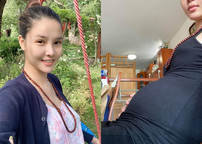 Kỳ Hân khoe bụng bầu để lộ da mụn chi chít