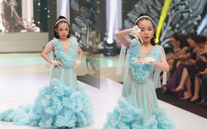 Mẫu nhí 7 tuổi mặc váy nặng 15kg, dài 2m vẫn catwalk cực đỉnh Ảnh 2