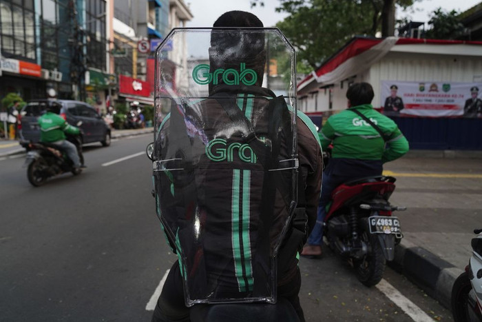 Grab đang là một trong những startup công nghệ giàu đầu tư nhất ở Đông Nam Á. Ảnh: Bloomberg