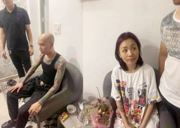 Vợ chồng Phú Lê tại cơ quan công an.