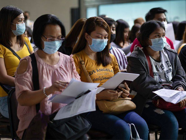 Bình Định xử phạt hành chính người không đeo khẩu trang nơi công cộng. Ảnh minh họa