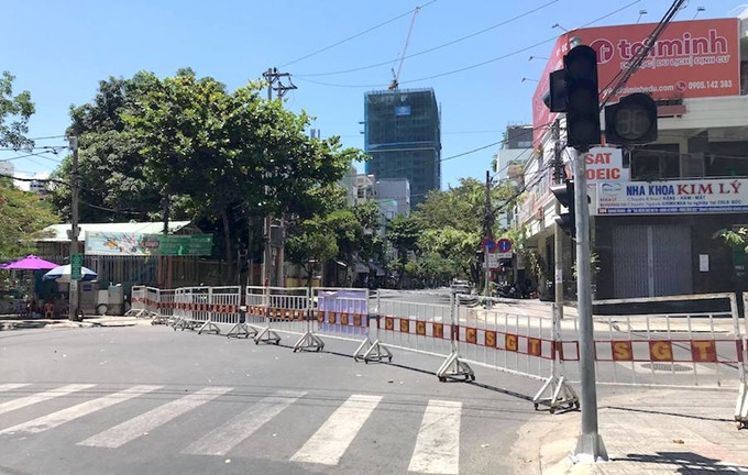 Một tiểu thương tại chợ đầu mối tại Đà Nẵng vừa được phát hiện mắc COVID-19. Ảnh minh họa