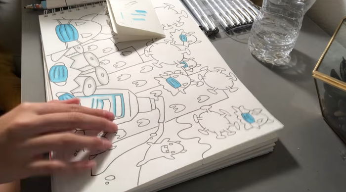 Cô nàng còn vẽ tranh cổ động Covid-  19 nữa này