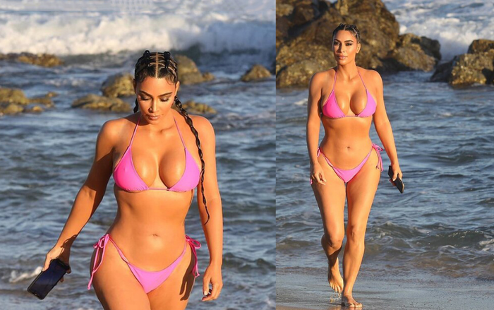 Kim Kardashian mặc bikini hồng chóe khoe khéo thân hình phồn thực trên bãi biển Ảnh 2