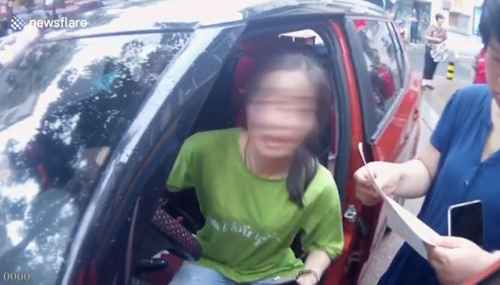 Nữ tài xế họ Zhu, người gây tai nạn cho shipper.