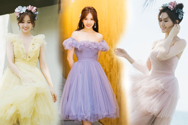 Từ sau khi về chung nhà với Trấn Thành, nhan sắc của Hari Won càng ngày càng thăng hạng. Mới đây, người đẹp liên tục thả thính fans với những bộ ảnh khoe nhan sắc xinh đẹp bên những mẫu váy voan bồng bềnh mang gam màu pastel. Thiết kế chiếc váy cô diện mang hơi hướng công chúa cổ tích, phần chân váy ngắn qua gối nhưng được xếp chồng nhiều lớp càng làm cho Hari Won đẹp như nàng thơ bước ra từ rừng xanh.