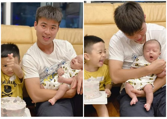 Duy Mạnh vừa bế con vừa cổ vũ Hà Nội FC Ảnh 2