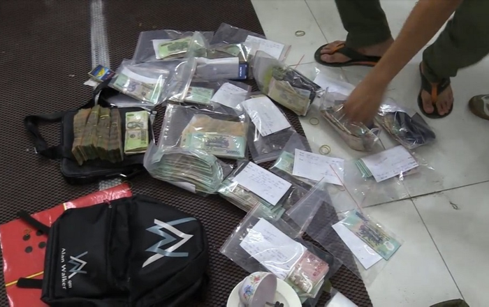Triệt phá sòng bạc nằm trong khu dân cư ở Bình Dương, thu giữ hơn 800 triệu đồng tiền mặt Ảnh 2