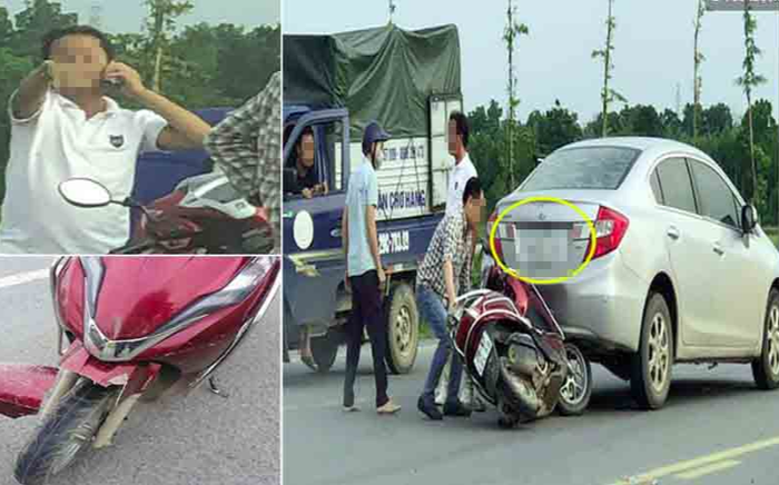 Clip: Lùi xe từ trên cầu xuống, xe ô tô kẹp xe máy vào gầm, thái độ của tài xế còn phẫn nộ hơn Ảnh 2