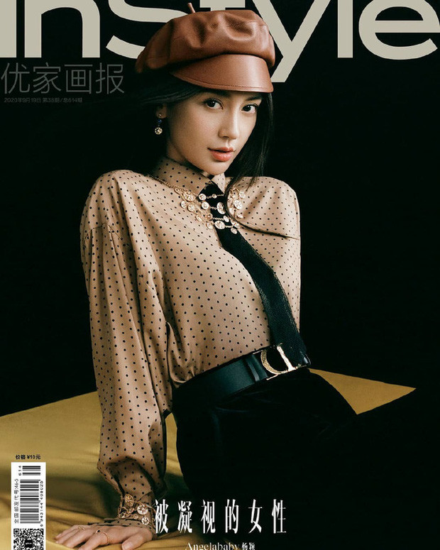 Một Angelababy đầy quý phái như một cô gái Pháp khi khoác trên mình sơ mi chấm bi mix cùng cà vạt nhấn nhá các phụ kiện trang sức dây chuyền mạ vàng