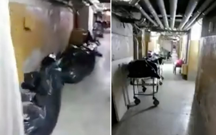 Thi thể bệnh nhân COVID-19 không kịp xử lý, nằm chật kín lối đi trong nhà xác ở Nga Ảnh 2