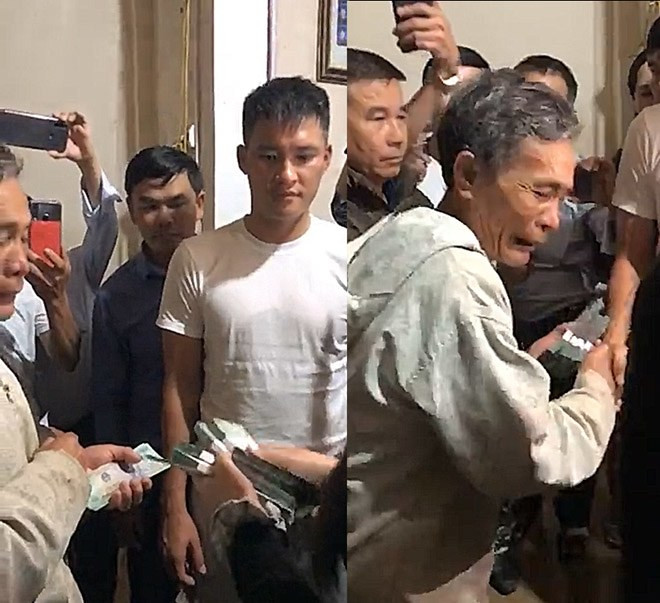 Người đàn ông lớn tuổi ở Tân Lâm Hương bật khóc khi được Công Vinh trao số tiền 200 triệu đồng.