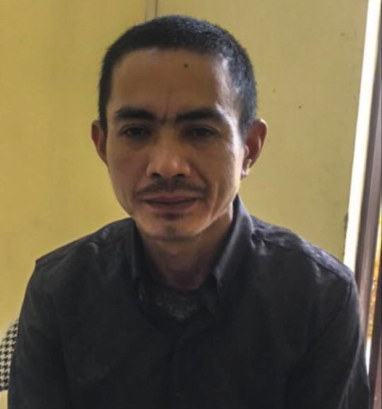 Nguyễn Văn Quân tại cơ quan công an