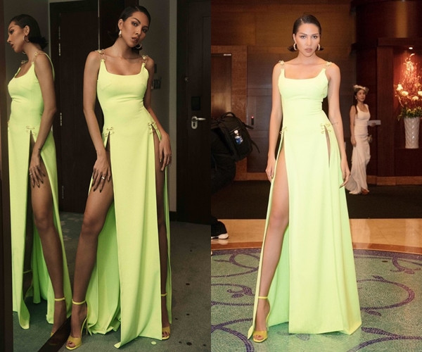 Mạnh dạn chọn chiếc đầm xẻ cao hai bên hông, Minh Triệu hẳn cũng không dễ dàng gì khi pose dáng. Người đẹp có thể bị hớ hênh bất cứ khi nào nếu chẳng may đôi tay đi chơi quá xa đùi.