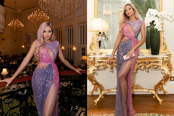 Thật may vì H'Hen Niê mang theo 'em' túi clutch cùng màu với chiếc đầm, vừa thời trang mà còn được trưng dụng khéo léo để che chắn cho phần xẻ cao.