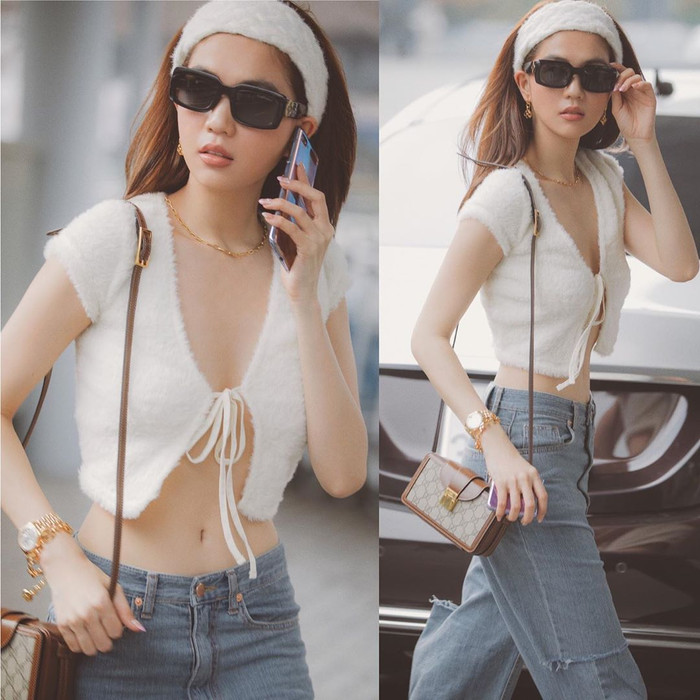 Gần đây nhất, người đẹp tiếp tục xuống phố với mẫu băng đô trắng cài tóc chất liệu lông. 