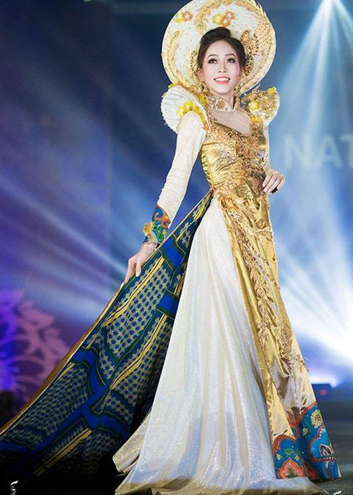 Bộ quốc phục mà Phương Nga mang đến Miss Grand International có tên gọi “Ngũ Phụng Tề Phi”, đã lọt top 10 Best National Costume. Tông chủ đạo của bộ trang phục là màu vàng Cung đình, được sử dụng với chất liệu gấm kết hợp với lụa truyền thống, mang ý tưởng về hình tượng Ngũ Phụng và pháp lam Huế.