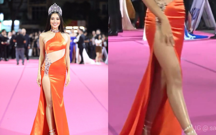 Tiểu Vy bối rối dùng tay che chắn trên thảm hồng vì váy xẻ cao bất tận Ảnh 2