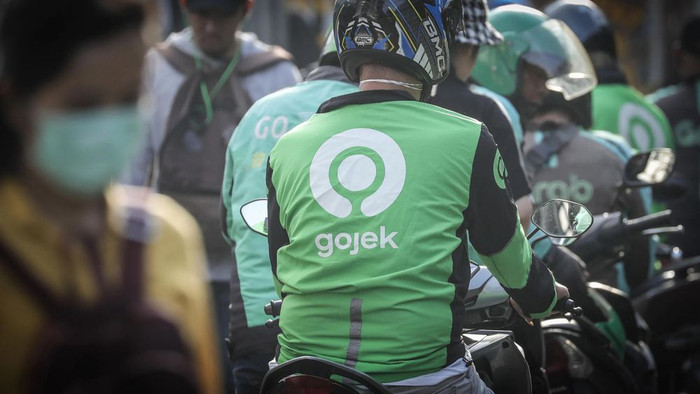 Grab và Gojek đều mong muốn trở thành siêu ứng dụng. Ảnh: Nikkei