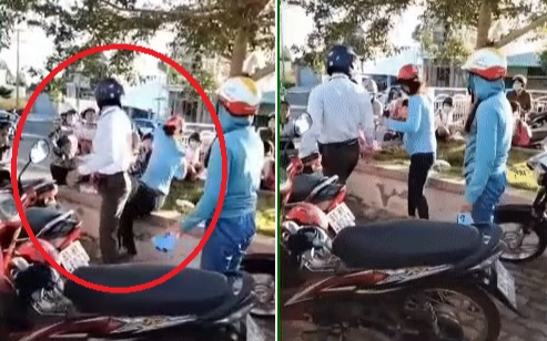 Gã đàn ông đánh ngã người phụ nữ trước cổng trường khi bị tố lừa đảo tiền làm sổ đỏ bị phạt 2,7 triệu Ảnh 2