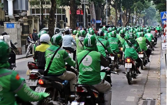 Tổng cục Thuế yêu cầu Grab giải trình vụ tăng cước khiến hàng nghìn tài xế 'diễu hành' phản đối Ảnh 2