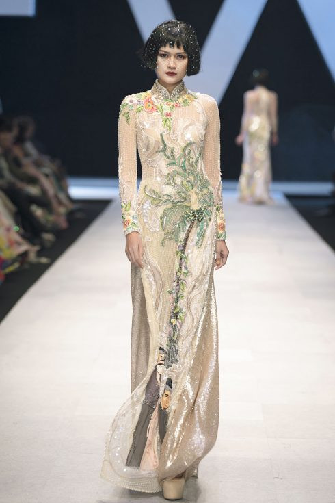 Hoa hậu Ngọc Châu diện áo dài với câu truyện 'Cây tre trăm đốt'. 