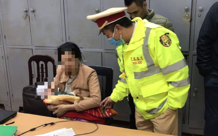 Ngăn cản kịp thời người phụ nữ bế con nhỏ định nhảy cầu tự tử lúc rạng sáng Ảnh 2