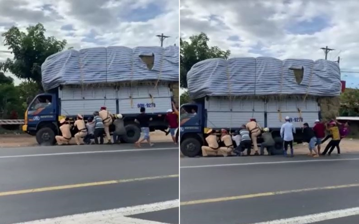 Clip: CSGT cùng 8 người đàn ông còng lưng cứu xe tải quá khổ Ảnh 2