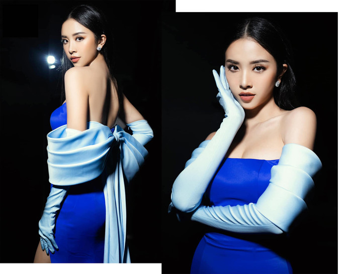 Á hậu Thúy An đã chọn lựa một kiểu váy đính nơ cách điệu cho khoảnh khắc chuyển giao quyền lực. 