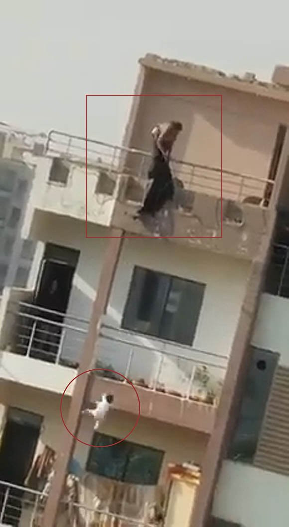 Bé Iman thoát chết thần kỳ sau khi được người dân dùng bạt đỡ.