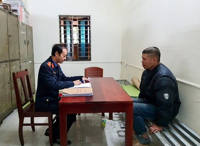 Đức tại cơ quan công an.