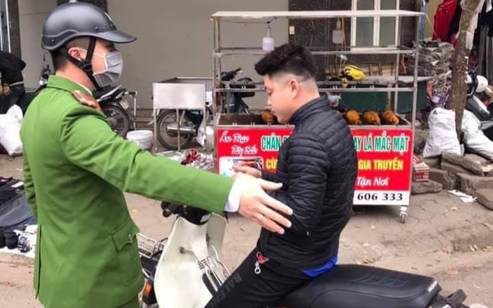 Phạt 9 triệu đồng 5 trường hợp không đeo khẩu trang phòng chống dịch COVID-19 khi đi ra đường Ảnh 2